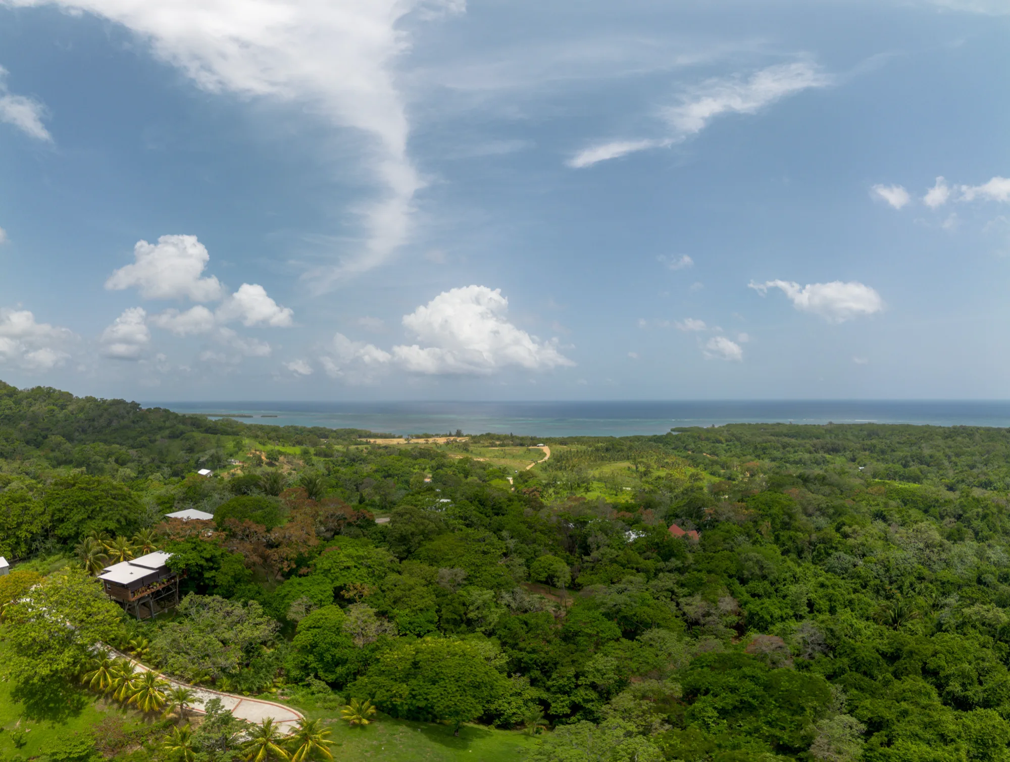 Aerial view over Turtling Bay toward the reef, Roatán